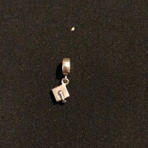 Graduation cap pandora charm.